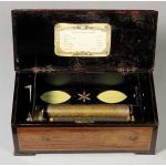 A hidden bells, drum and castanet cylinder music box