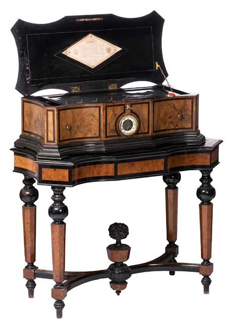 A fine burl walnut and ebonised wooden cylinder music box with orchestreon organ