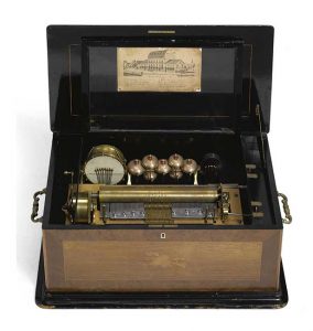 A Swiss rosewood and maple inlaid cylinder drum bells wood block and organ music box, late 19th century