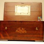 Cylinder musical box in a rosewood case with marquetry decoration