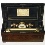 A WALNUT MUSIC BOX, SWISS, 19TH CENTURY