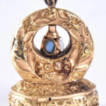 French gold miniature fob music box